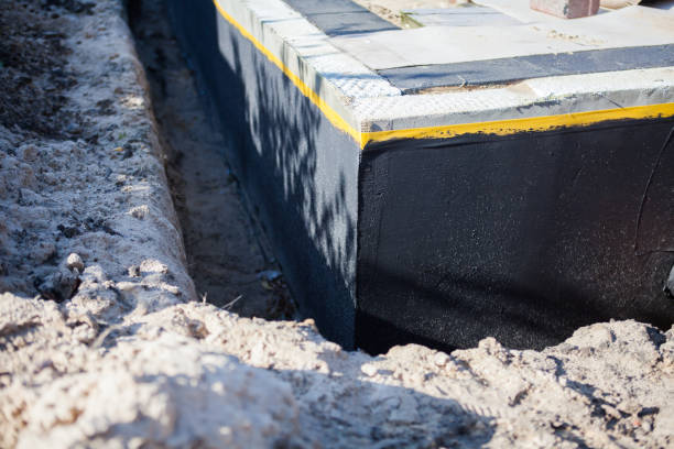Professional Waterproofing technician working in Whitehouse Station, NJ